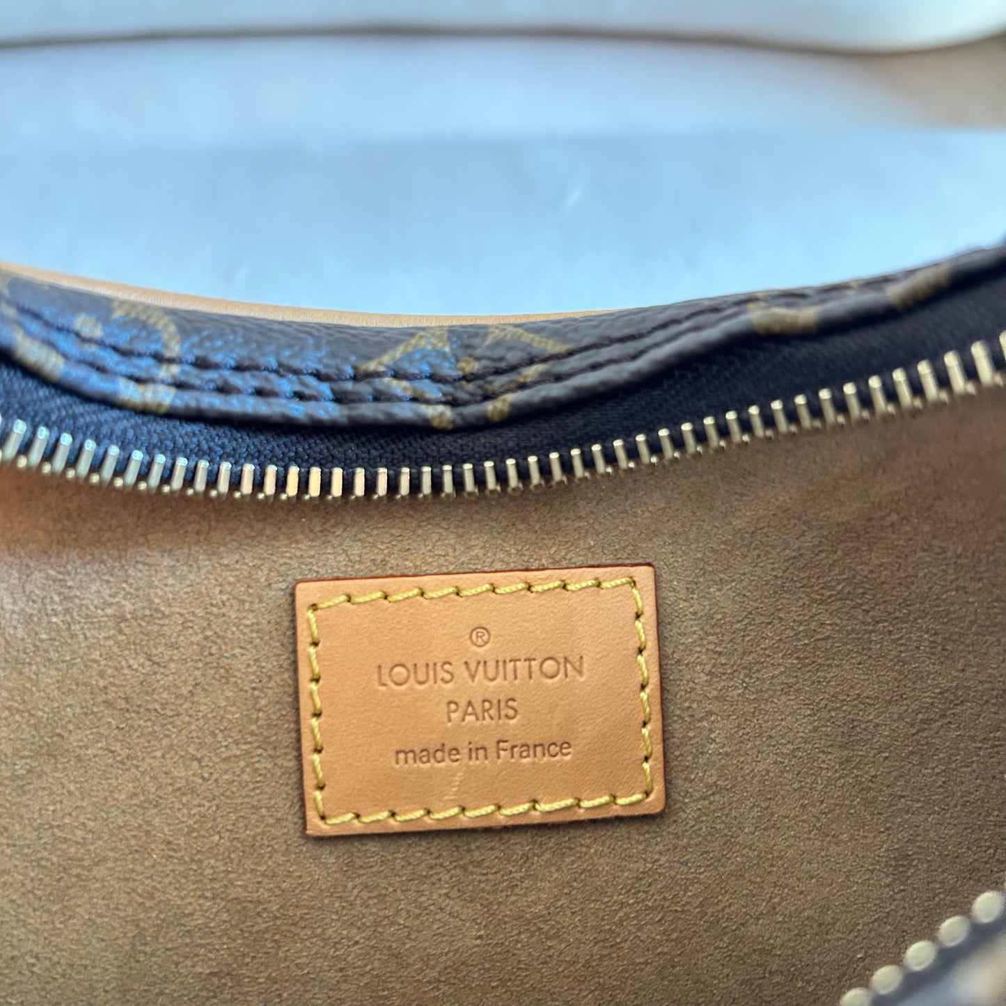 Logo on Pre-Loved Louis Vuitton Monogram Loop